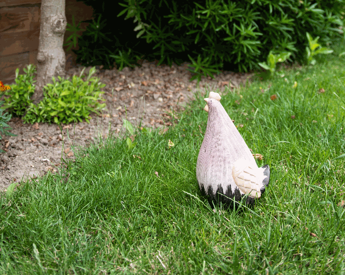 Figurine poule en céramique lignée rose