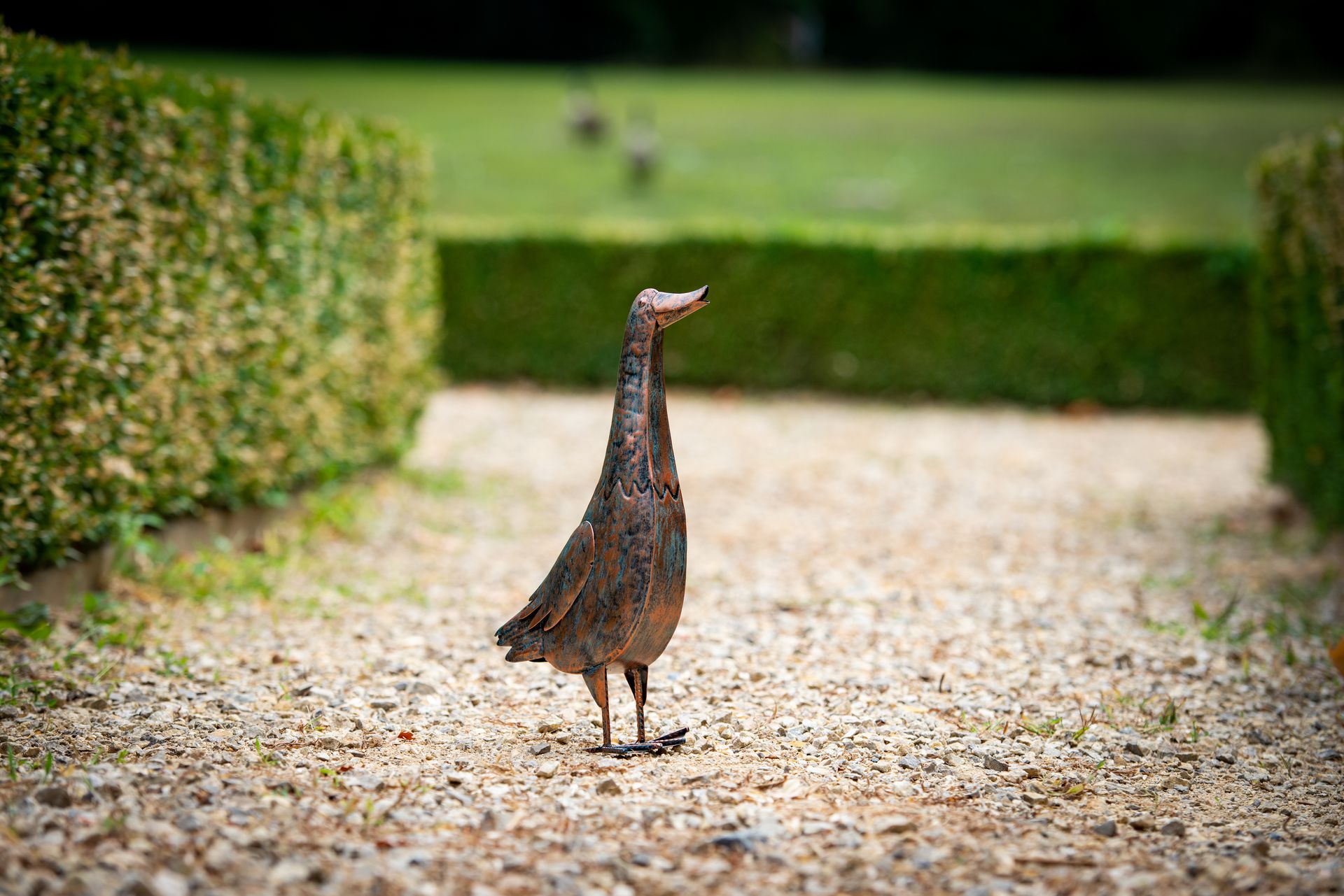 Figurine canard en métal antique